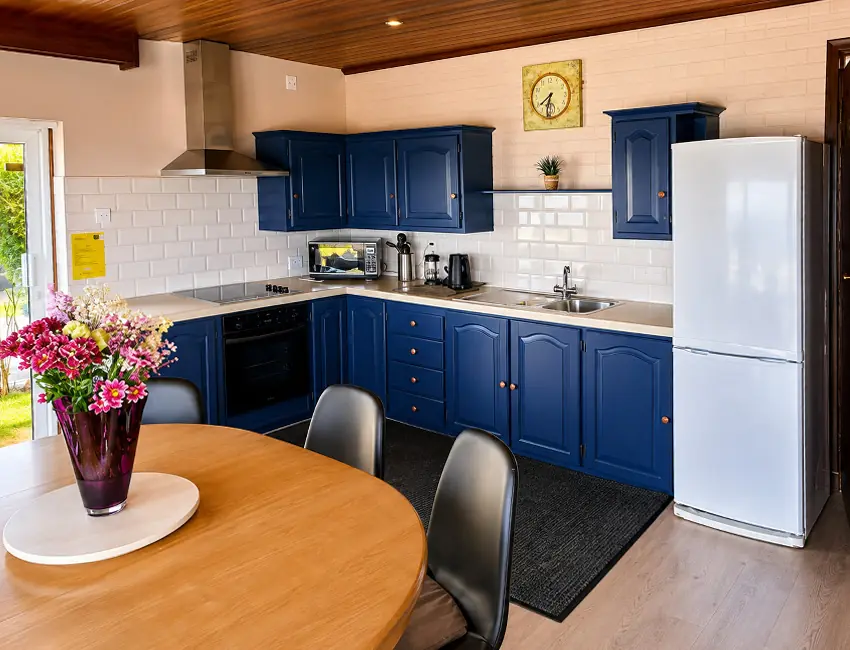 Blue full kitchen at Dolphin House